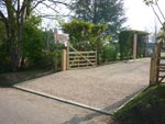 Gravel drive and a five bar gate